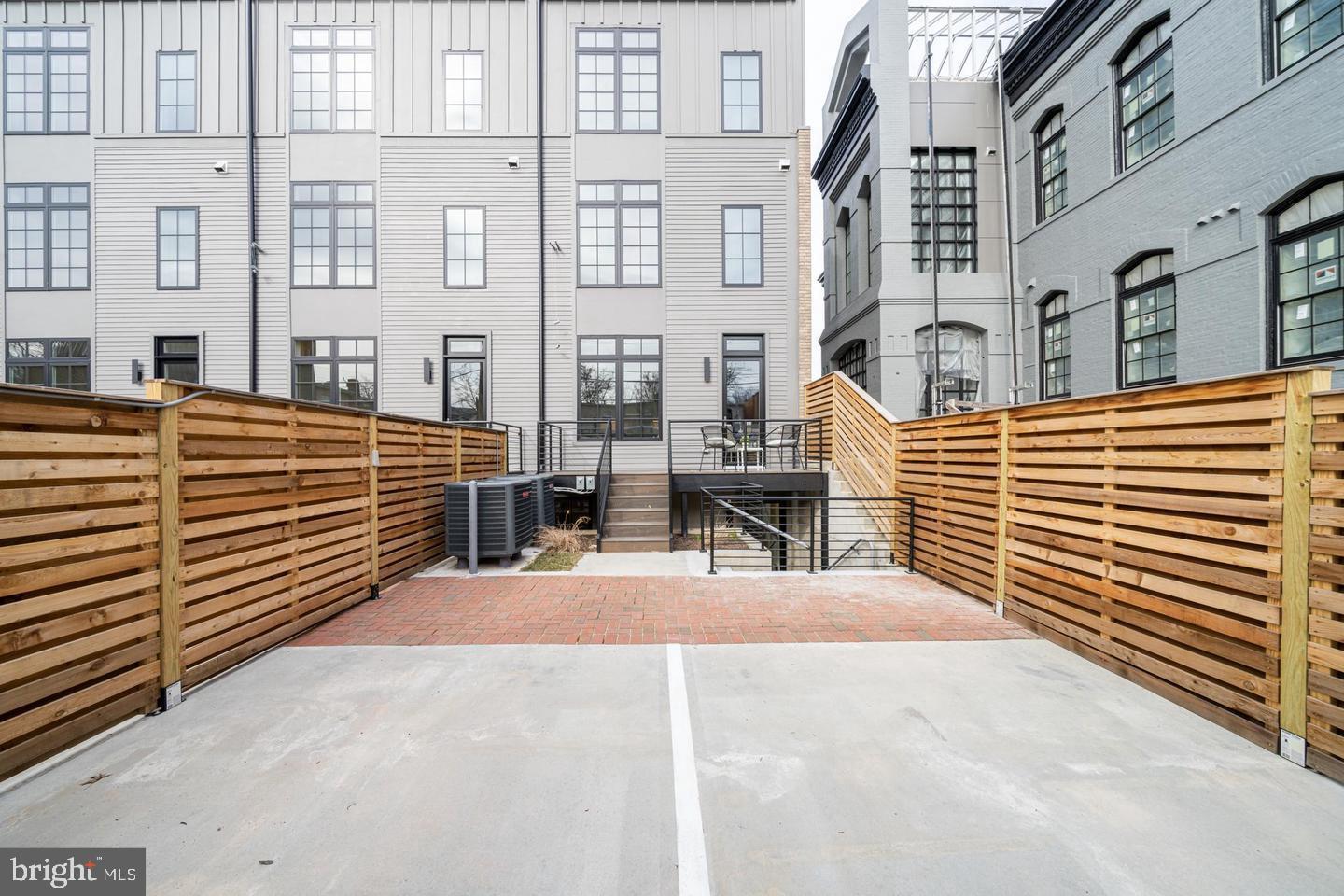 442 R Street Northwest, Unit A Washington, DC 20001 - Photo 20 of 25 a view of a building with many windows