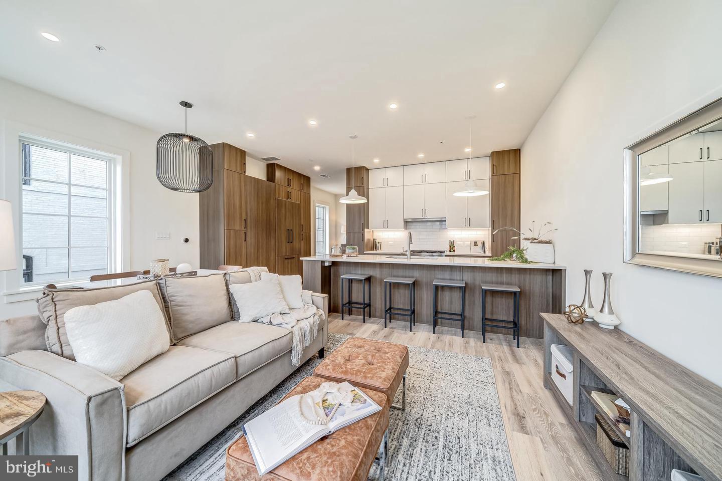 442 R Street Northwest, Unit A Washington, DC 20001 - Photo 6 of 25 a living room with furniture and a wooden floor