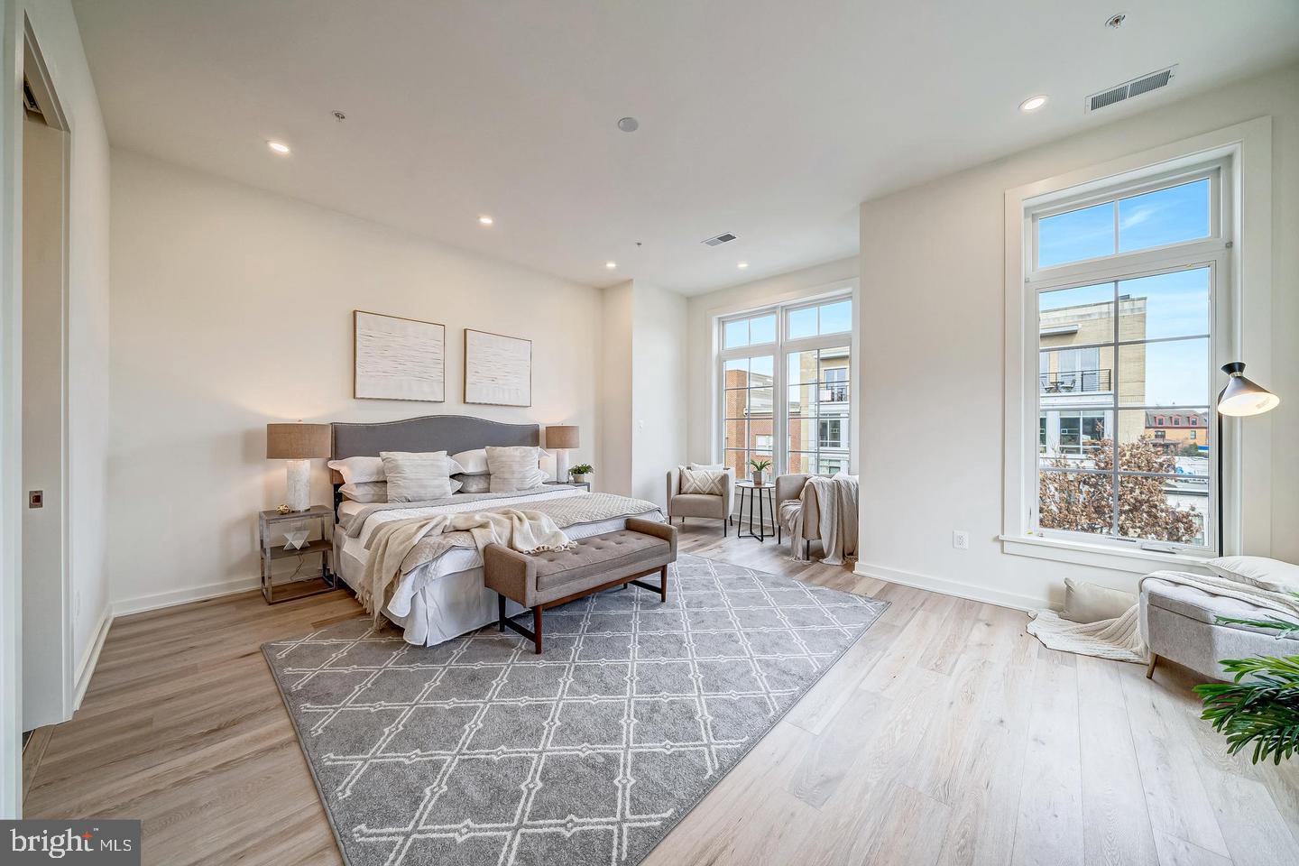 442 R Street Northwest, Unit A Washington, DC 20001 - Photo 8 of 25 a spacious bedroom with a bed and a large window