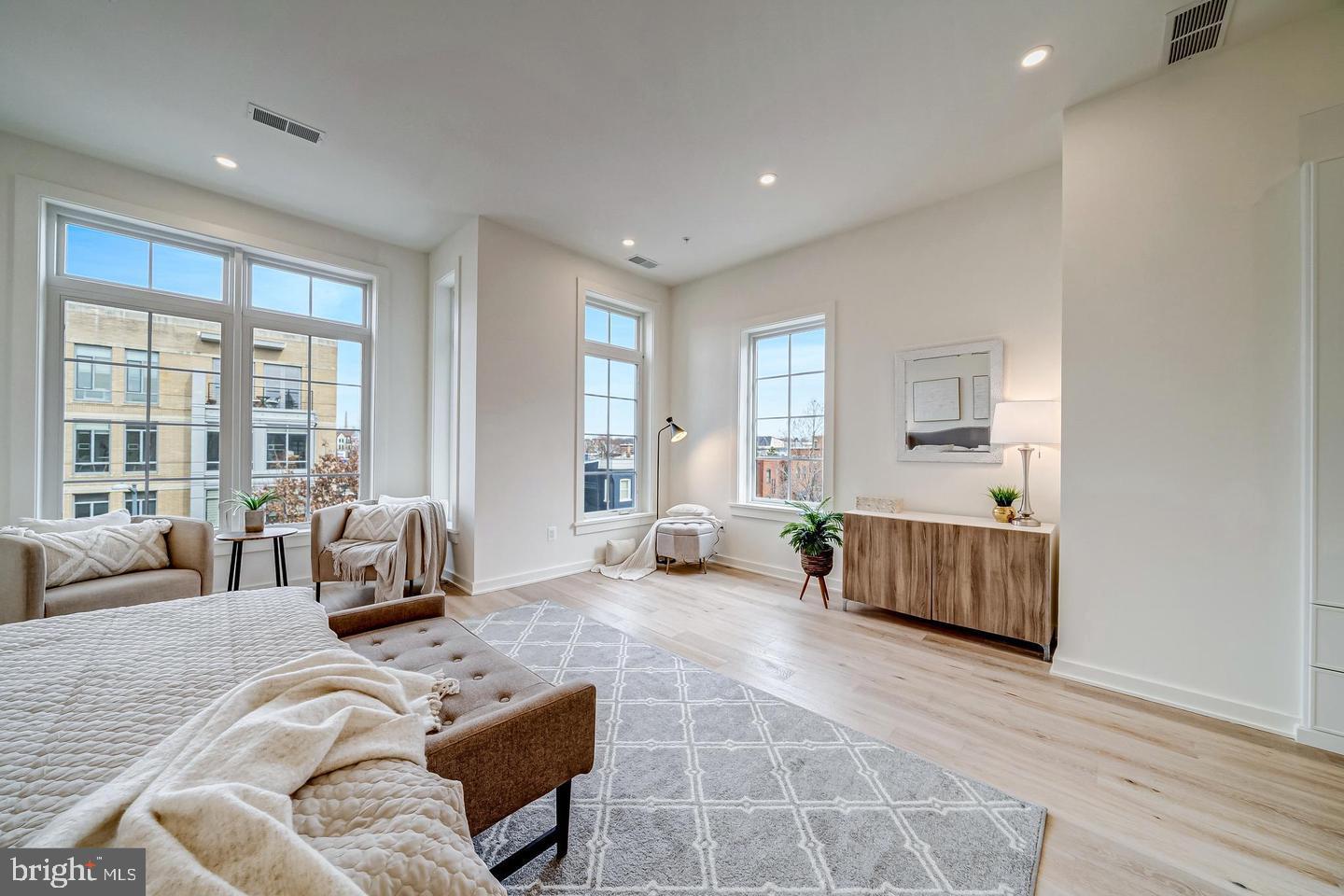 442 R Street Northwest, Unit A Washington, DC 20001 - Photo 9 of 25 a living room with furniture and a large window
