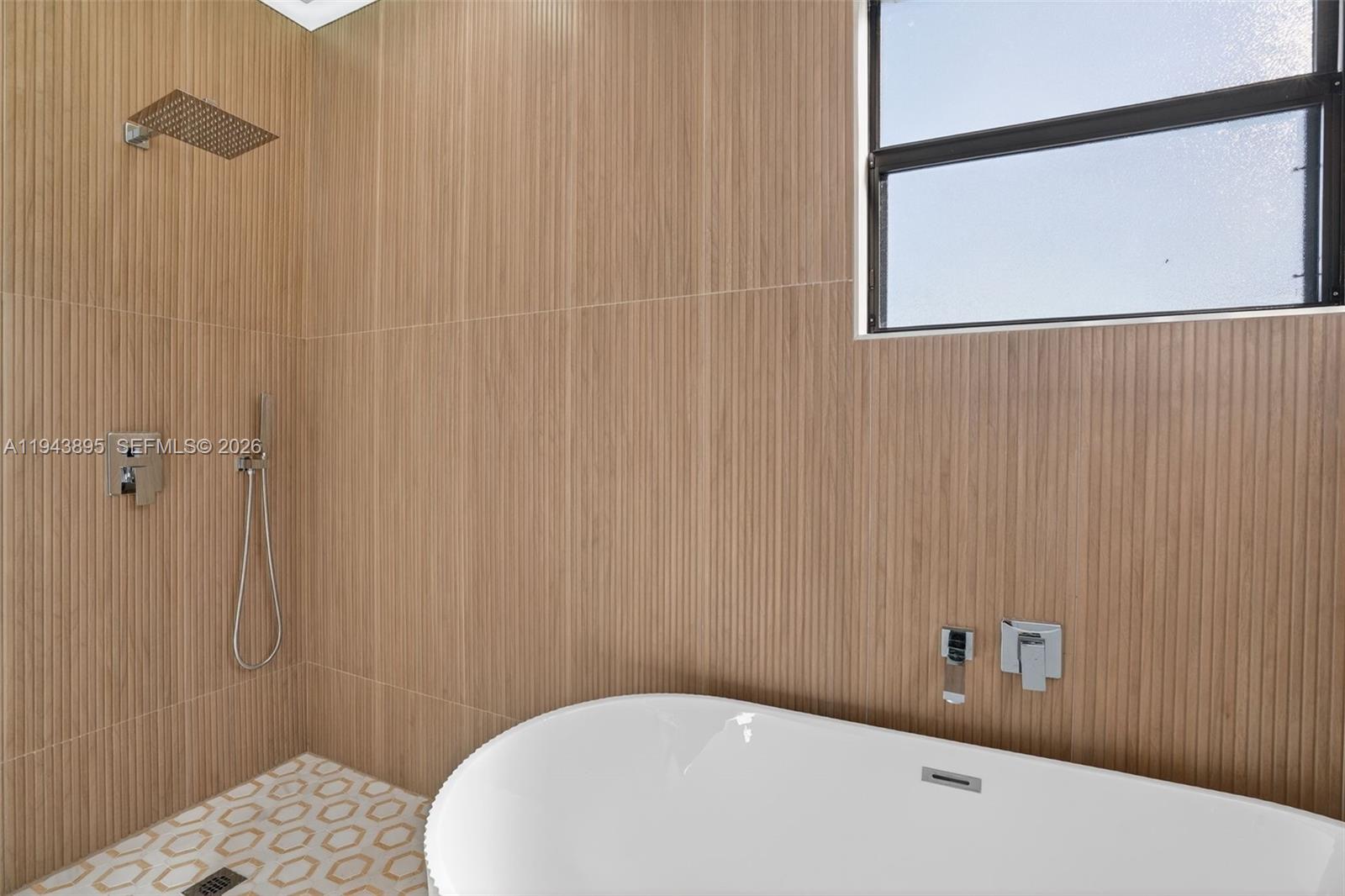 11556 Southwest 234th Street Homestead, FL 33032 - Photo 23 of 44 a bathroom with a sink and a shower