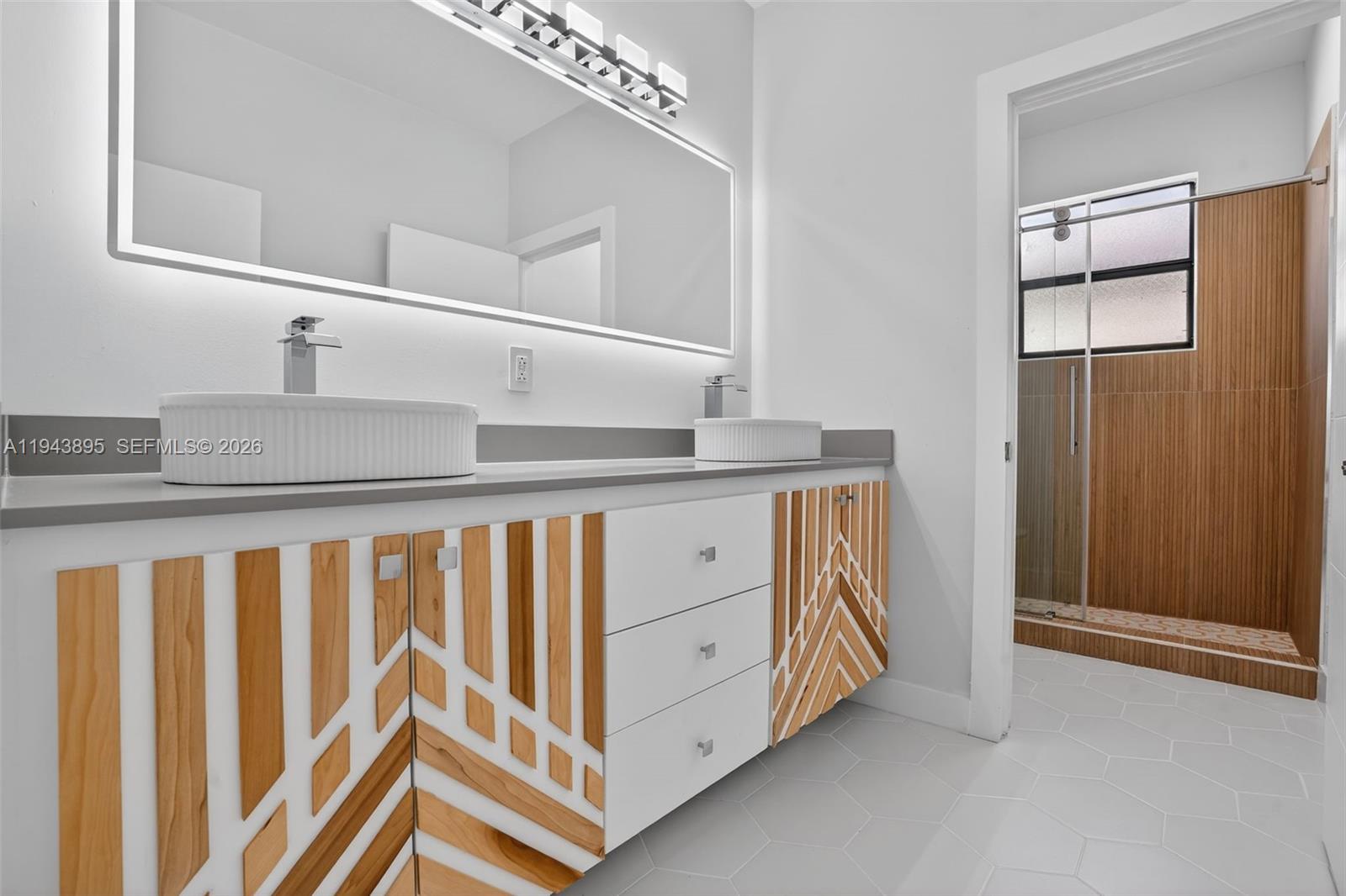 11556 Southwest 234th Street Homestead, FL 33032 - Photo 32 of 44 a kitchen with a sink and cabinets