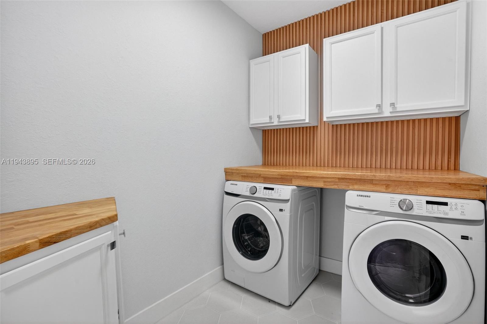 11556 Southwest 234th Street Homestead, FL 33032 - Photo 35 of 44 a utility room with dryer and washer