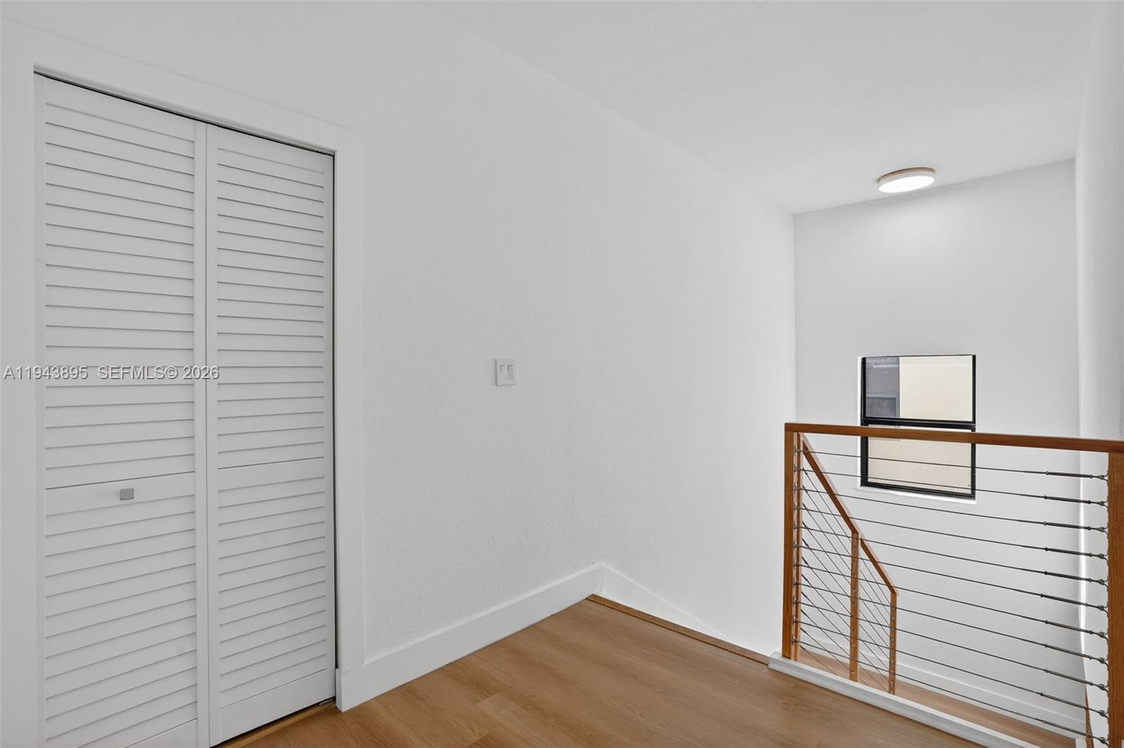 11556 Southwest 234th Street Homestead, FL 33032 - Photo 36 of 44 a view of staircase with wooden floor