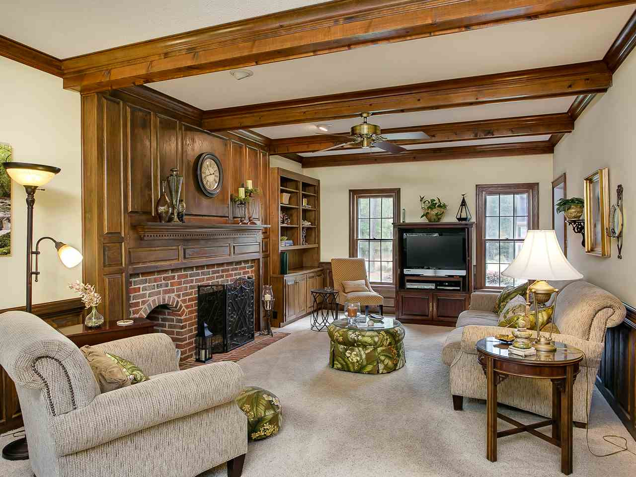 Gorgeous accent beams and built in bookshelves. Access the bonus room via the rear staircase from this room. Front to Back Family Room