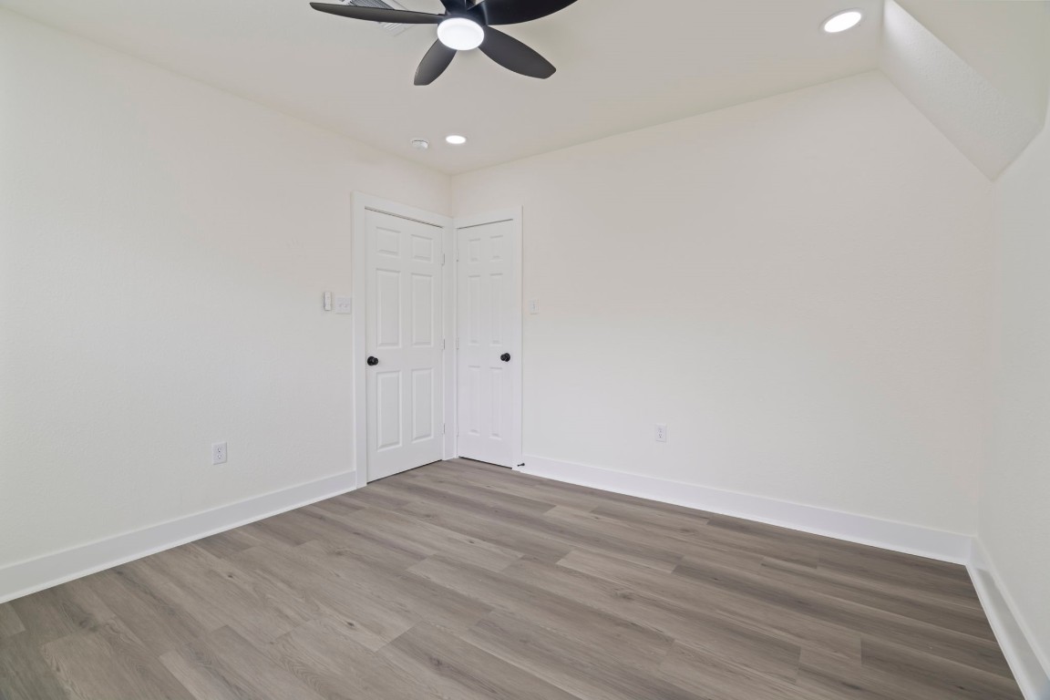 2817 Winbern Street Houston, TX 77004 - Photo 15 of 23 a view of a room with wooden floor