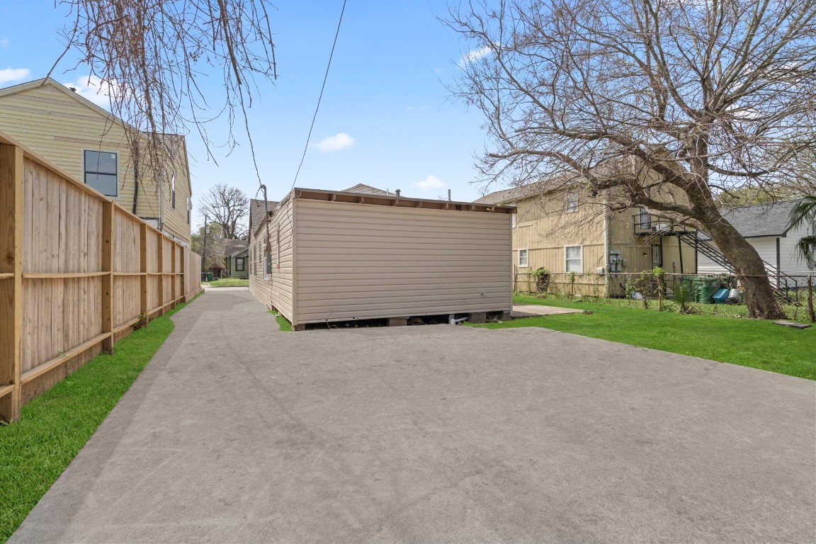 2817 Winbern Street Houston, TX 77004 - Photo 2 of 23 a view of backyard and garage