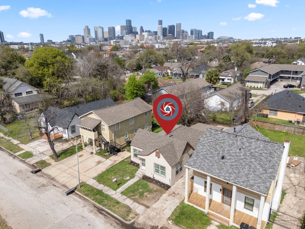 2817 Winbern Street Houston, TX 77004 - Photo 23 of 23 an aerial view of a house with garden space and a street view