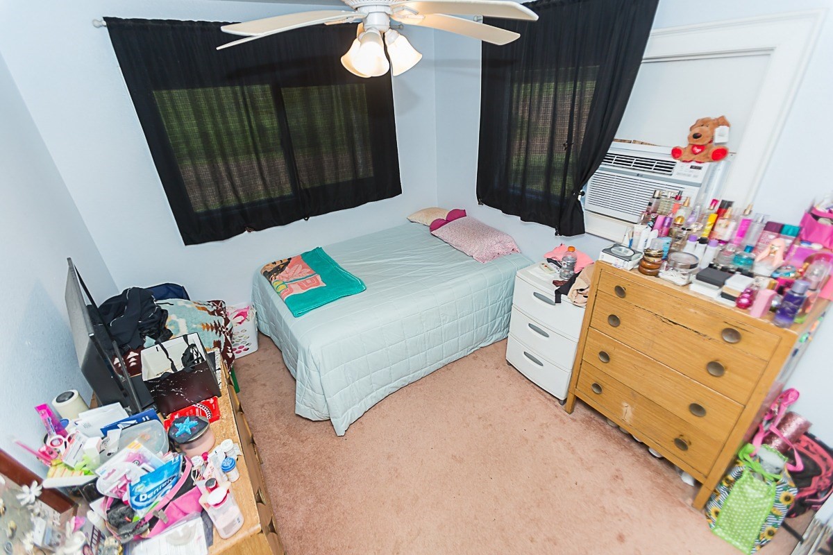 3280 Hailima Road Koloa, HI 96756 - Photo 6 of 13 a bedroom with a bed and a small dresser