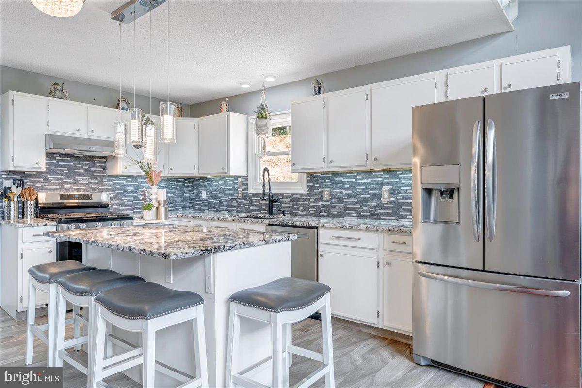 722 Foley Ridge Road Stuart, VA 24171 - Photo 24 of 67 Modern kitchen with sleek finishes.