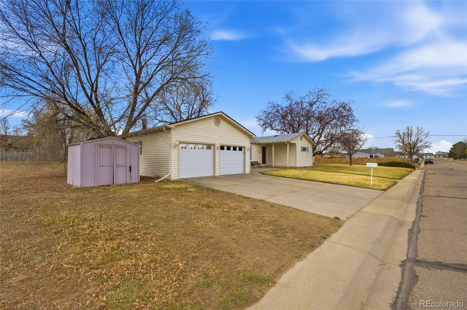 308 Fifth Street Dacono, CO 80514 - Photo 2 of 29 a view of residential houses with yard and entertaining space