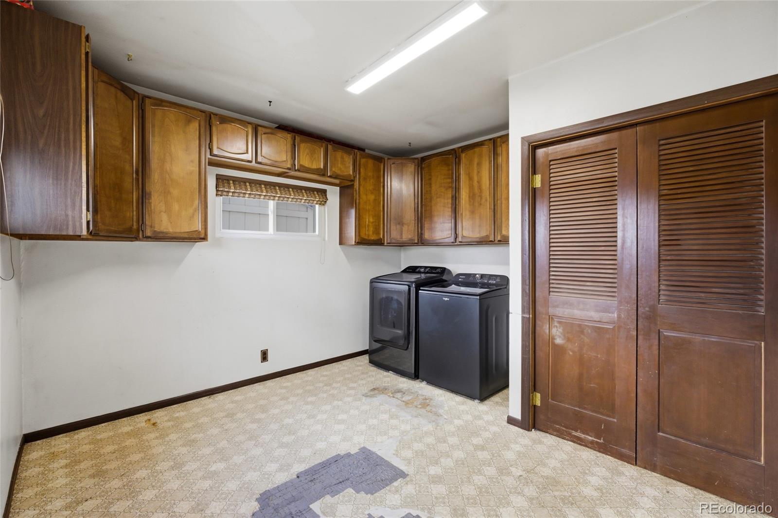 308 Fifth Street Dacono, CO 80514 - Photo 21 of 29 a view of a storage & utility room