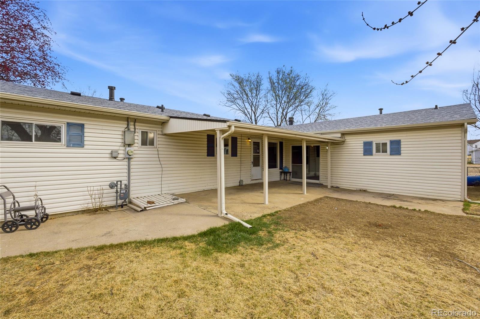 308 Fifth Street Dacono, CO 80514 - Photo 24 of 29 front view of a house