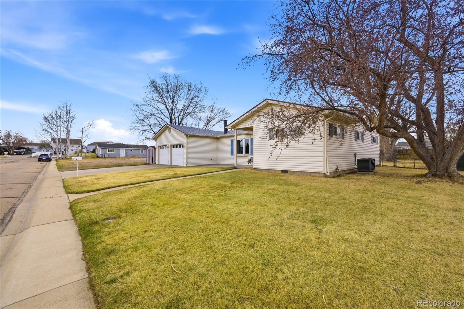 308 Fifth Street Dacono, CO 80514 - Photo 25 of 29 a house view with a outdoor space