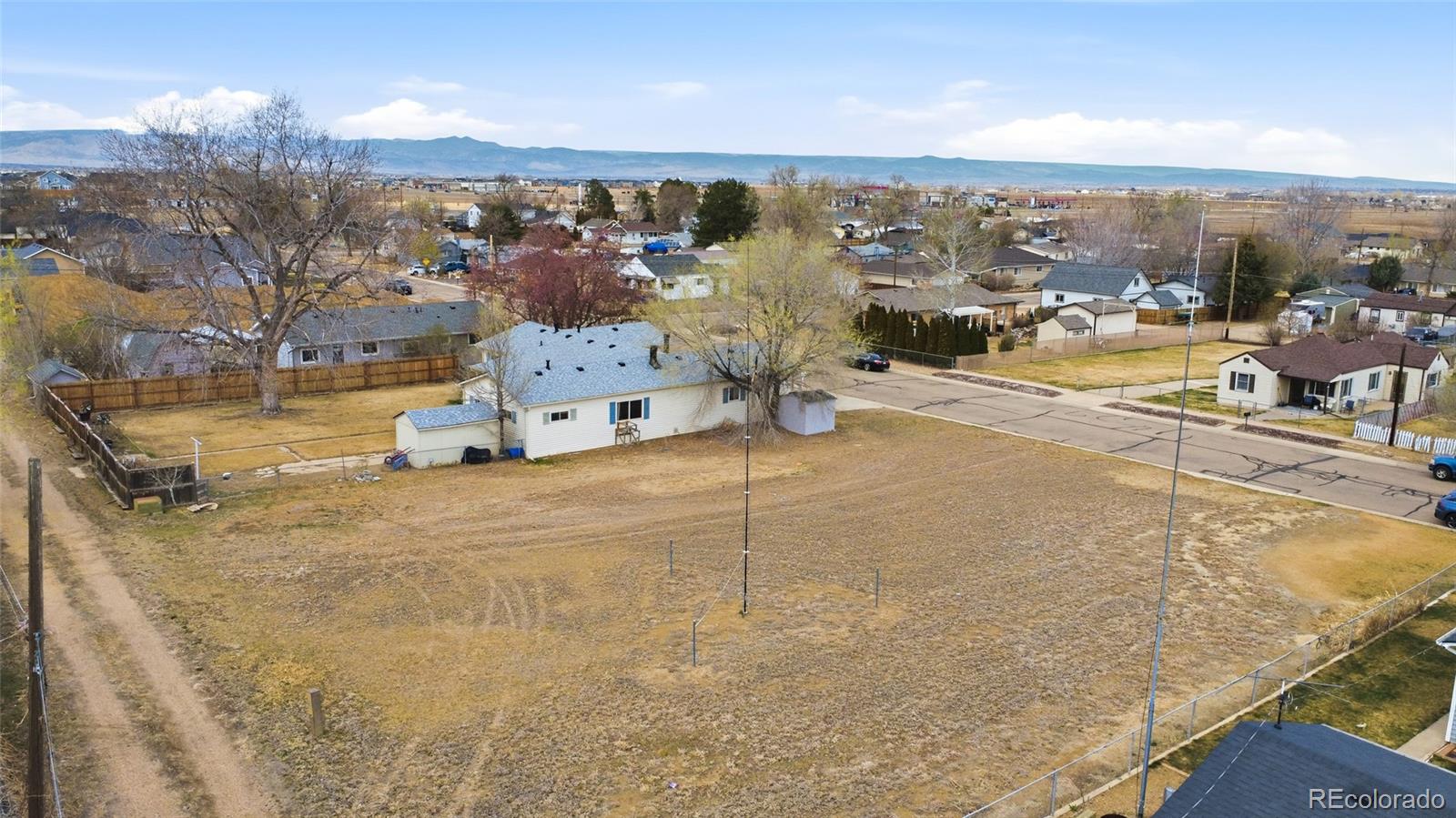 308 Fifth Street Dacono, CO 80514 - Photo 27 of 29 a view of a city