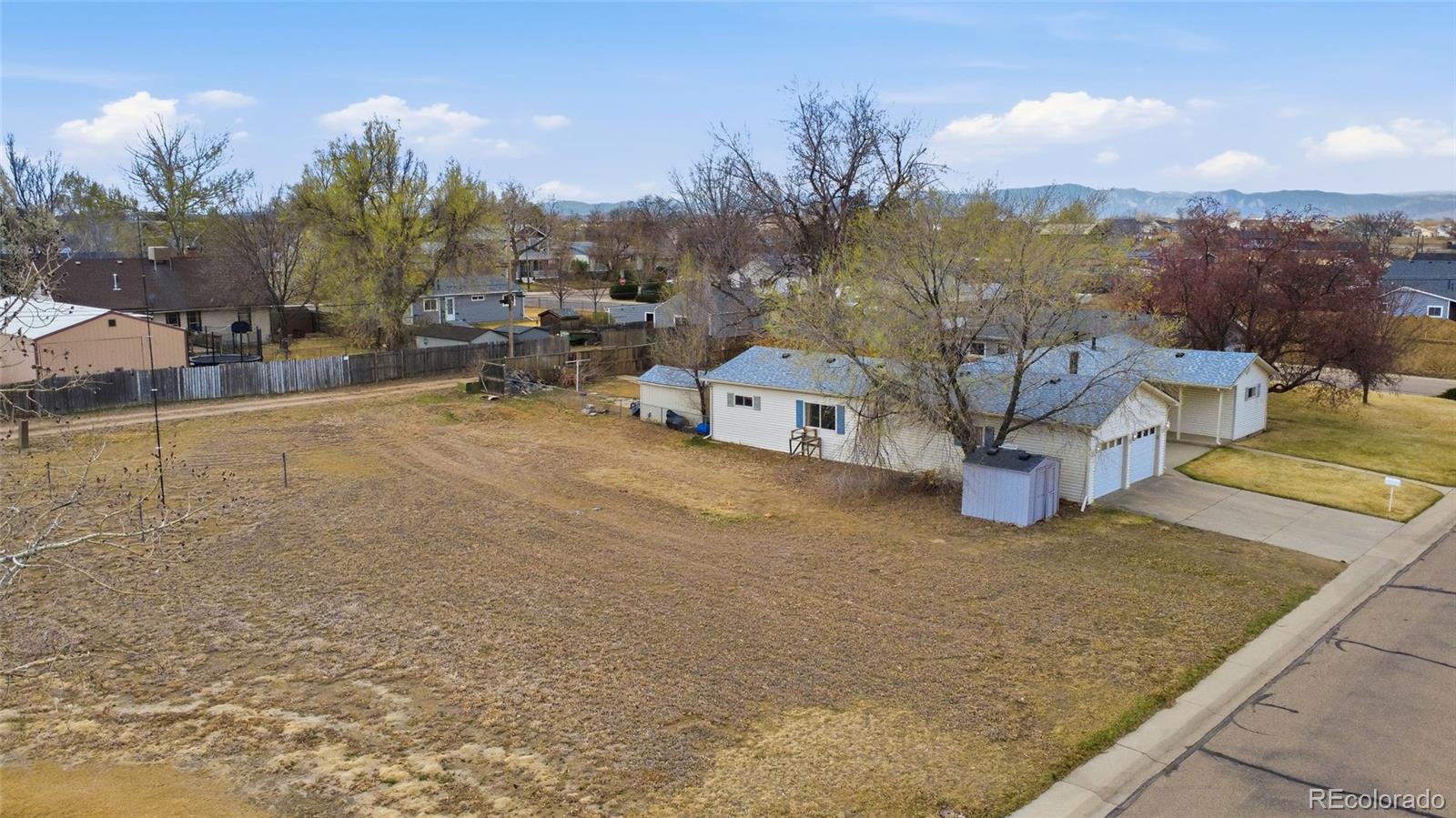 308 Fifth Street Dacono, CO 80514 - Photo 3 of 29 a view of a terrace