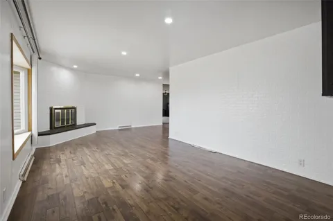 a view of a livingroom with a fireplace