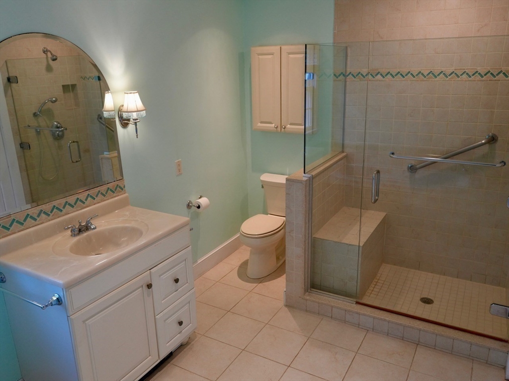 45 Bumblebee Hill Road Falmouth, MA 02540 - Photo 16 of 30 a bathroom with a sink toilet and shower