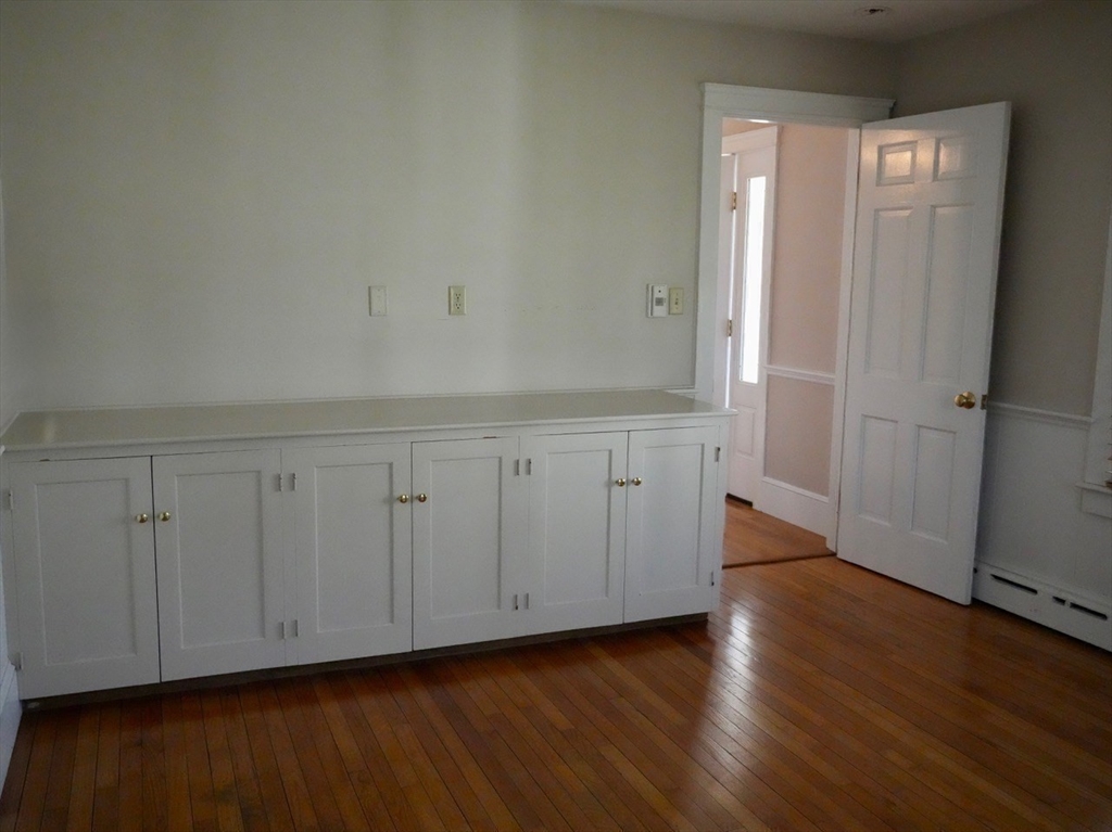 45 Bumblebee Hill Road Falmouth, MA 02540 - Photo 17 of 30 an empty room with wooden floor