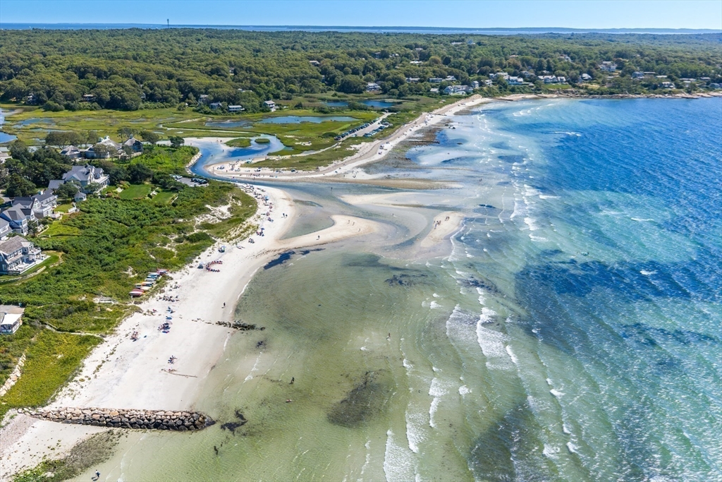 45 Bumblebee Hill Road Falmouth, MA 02540 - Photo 27 of 30 a view of a lake in a field