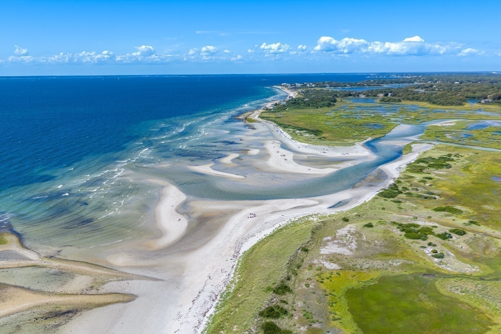 45 Bumblebee Hill Road Falmouth, MA 02540 - Photo 29 of 30 a view of a swimming pool with a yard