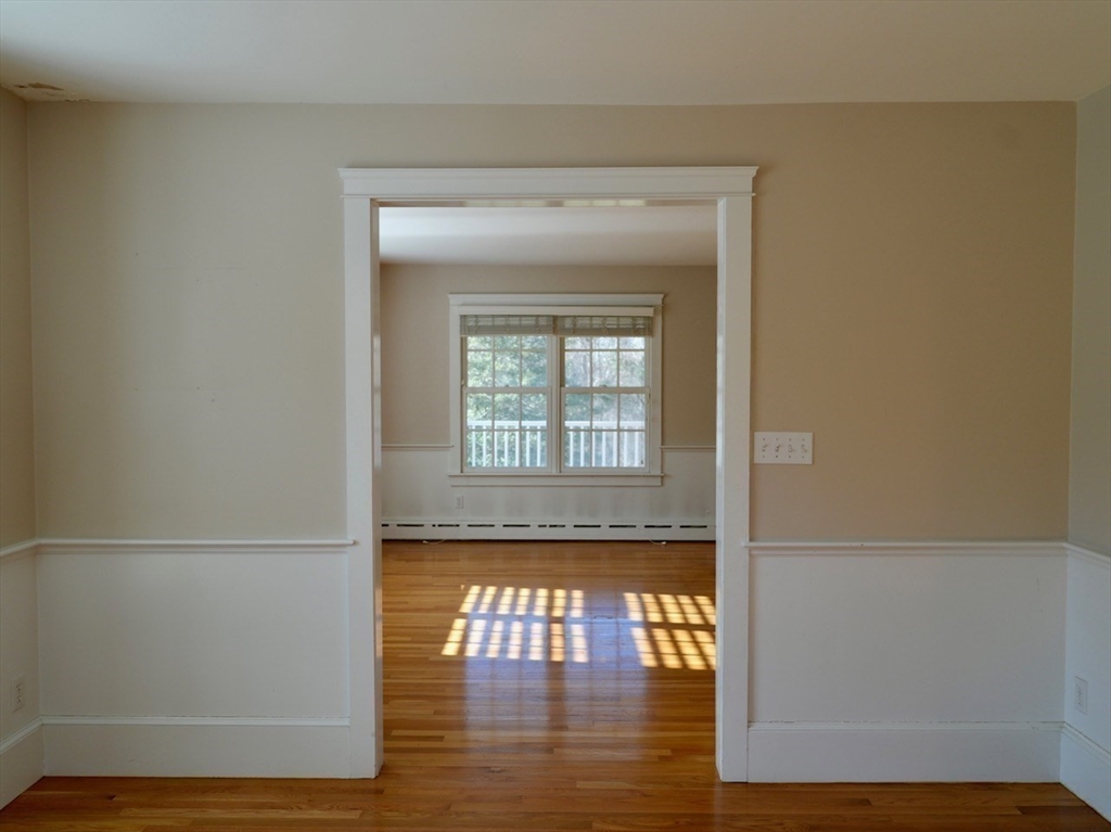 45 Bumblebee Hill Road Falmouth, MA 02540 - Photo 9 of 30 a view of a small space with wooden floor and a window