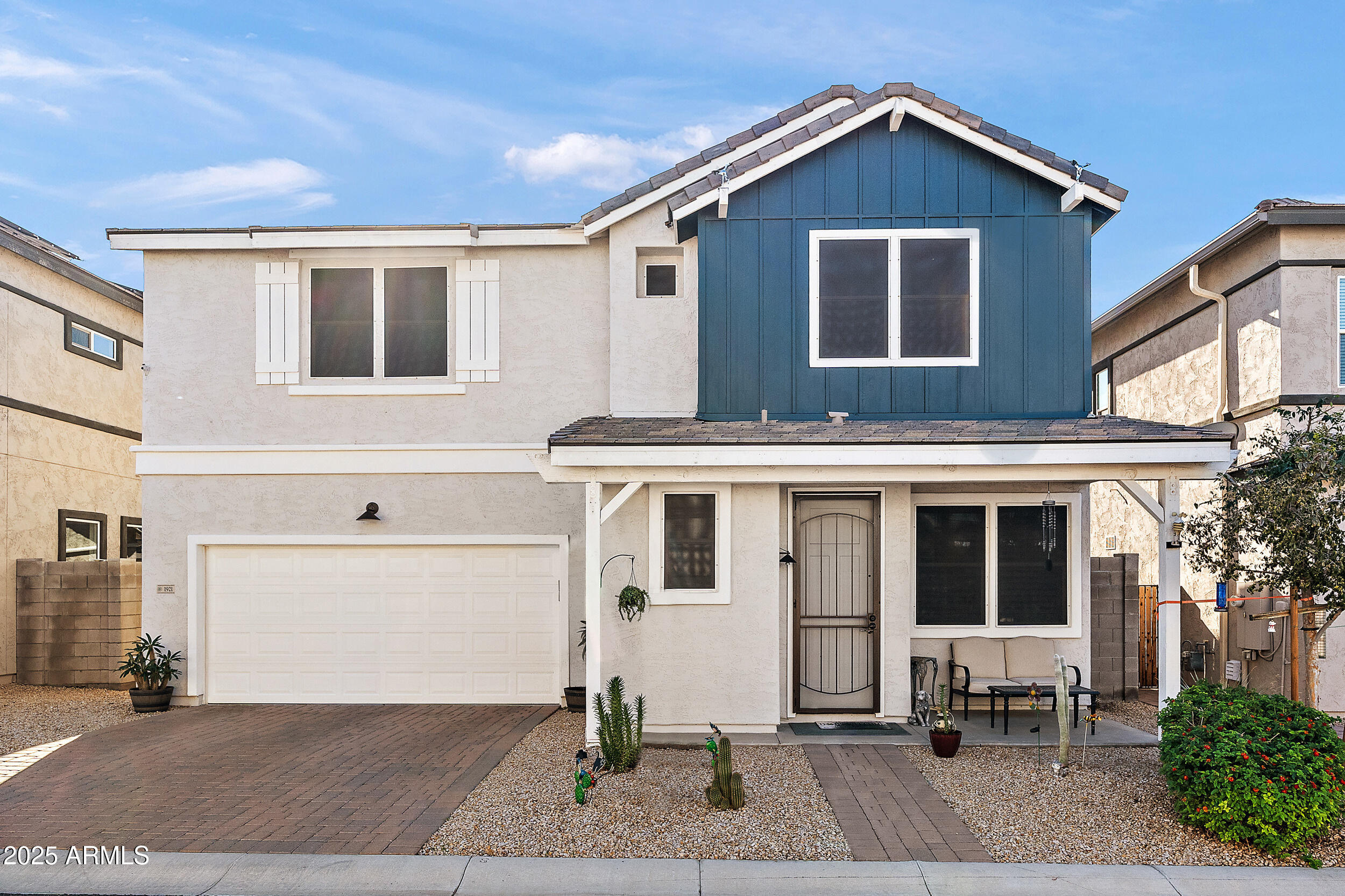 1921 West 22nd Avenue Apache Junction, AZ 85120 - Photo 1 of 38 a front view of a house with a yard