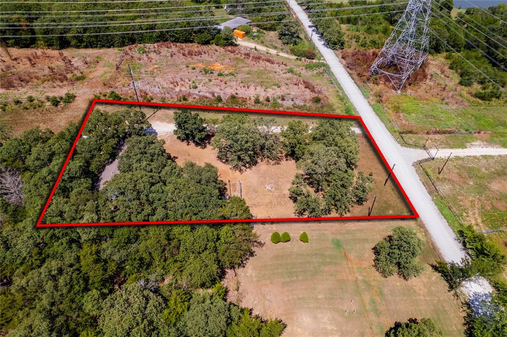 1285 Clark Road Gainesville, TX 76240 - Photo 20 of 20 This property features a substantial land parcel with mature trees and a clear boundary outline