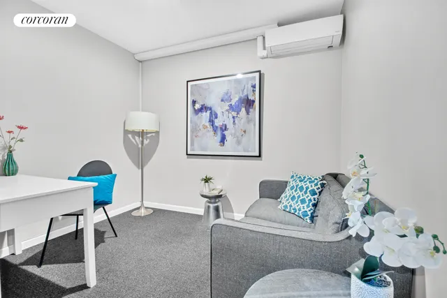 a kitchen with granite countertop a refrigerator and a sink