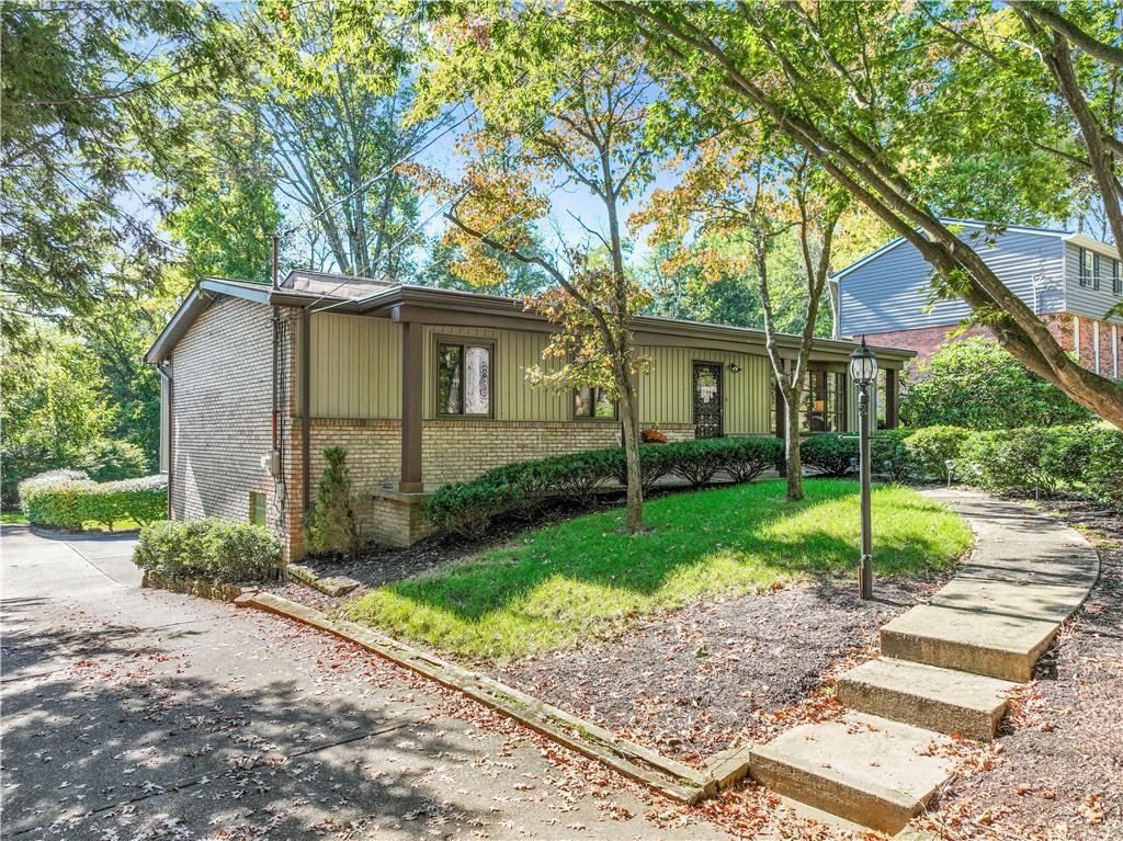 464 Sharon Road Coraopolis, PA 15108 - Photo 1 of 34 Welcome home to a charming property featuring a two-car garage, ranch with a finished basement, and a spacious backyard in the coveted Moon Township Area School district.