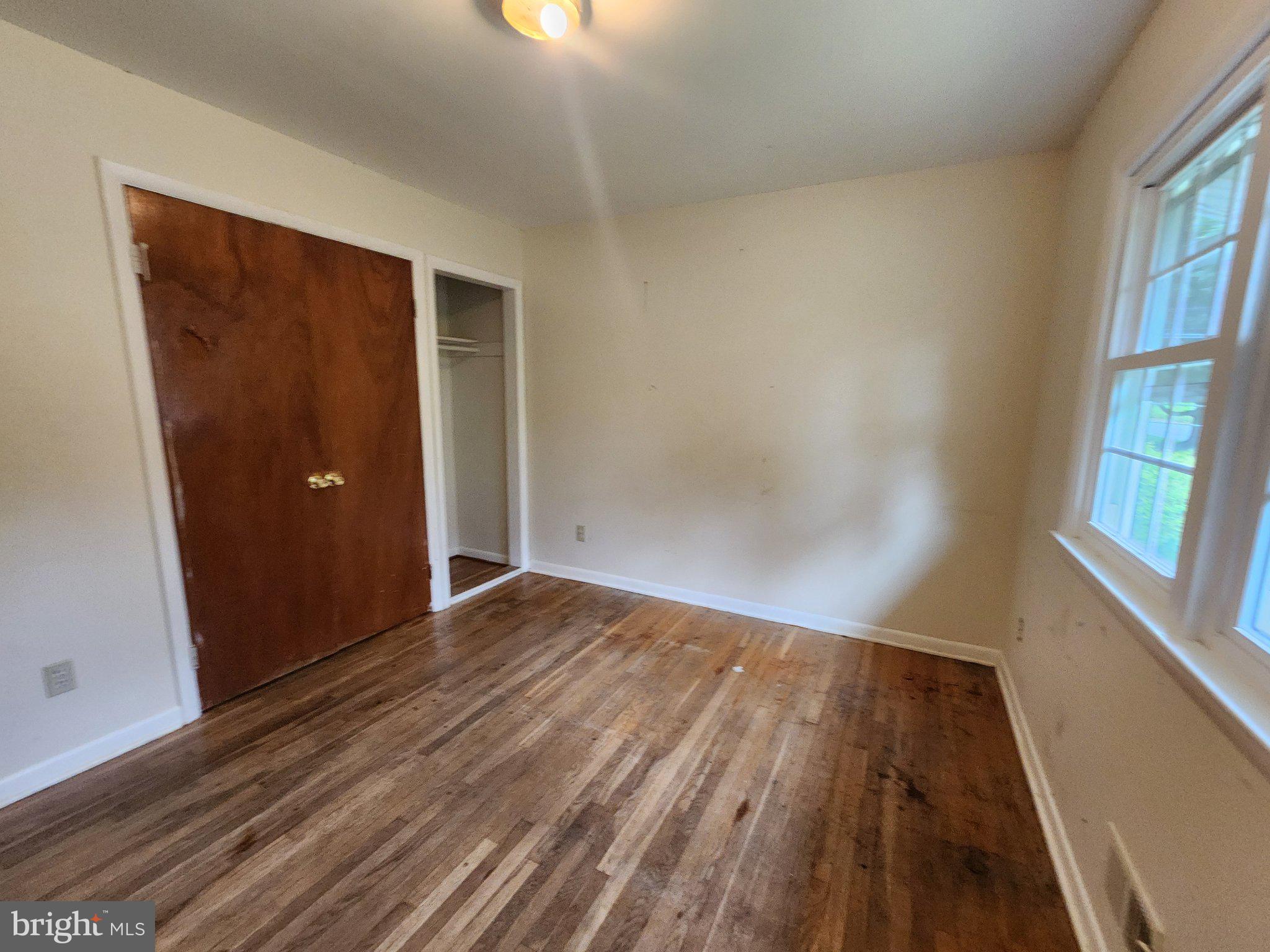 2005 Prichard Road Silver Spring, MD 20902 - Photo 14 of 26 Bright and airy room with hardwood floors.