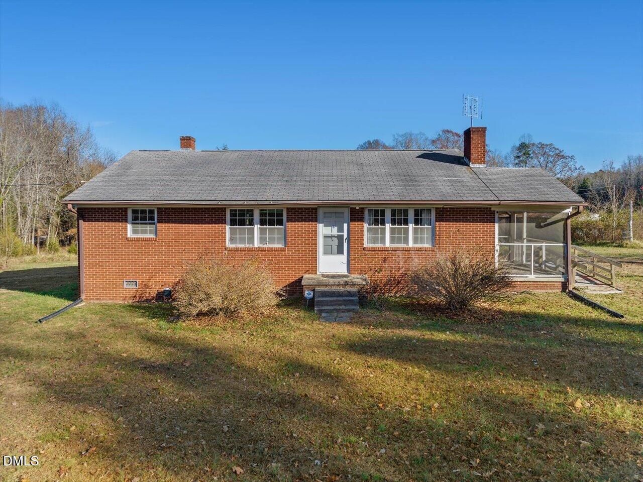 8909 Wilkerson Road Cedar Grove, NC 27231 - Photo 1 of 33 05-Front Exterior