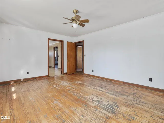 a kitchen with granite countertop cabinets and window