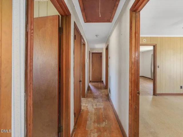 a view of empty room with windows