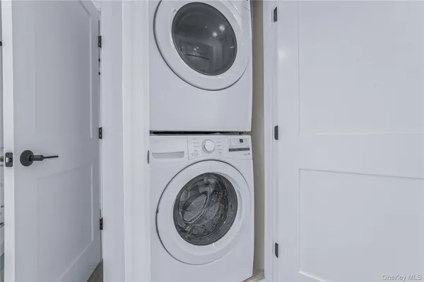 a view of a street with a building in the background