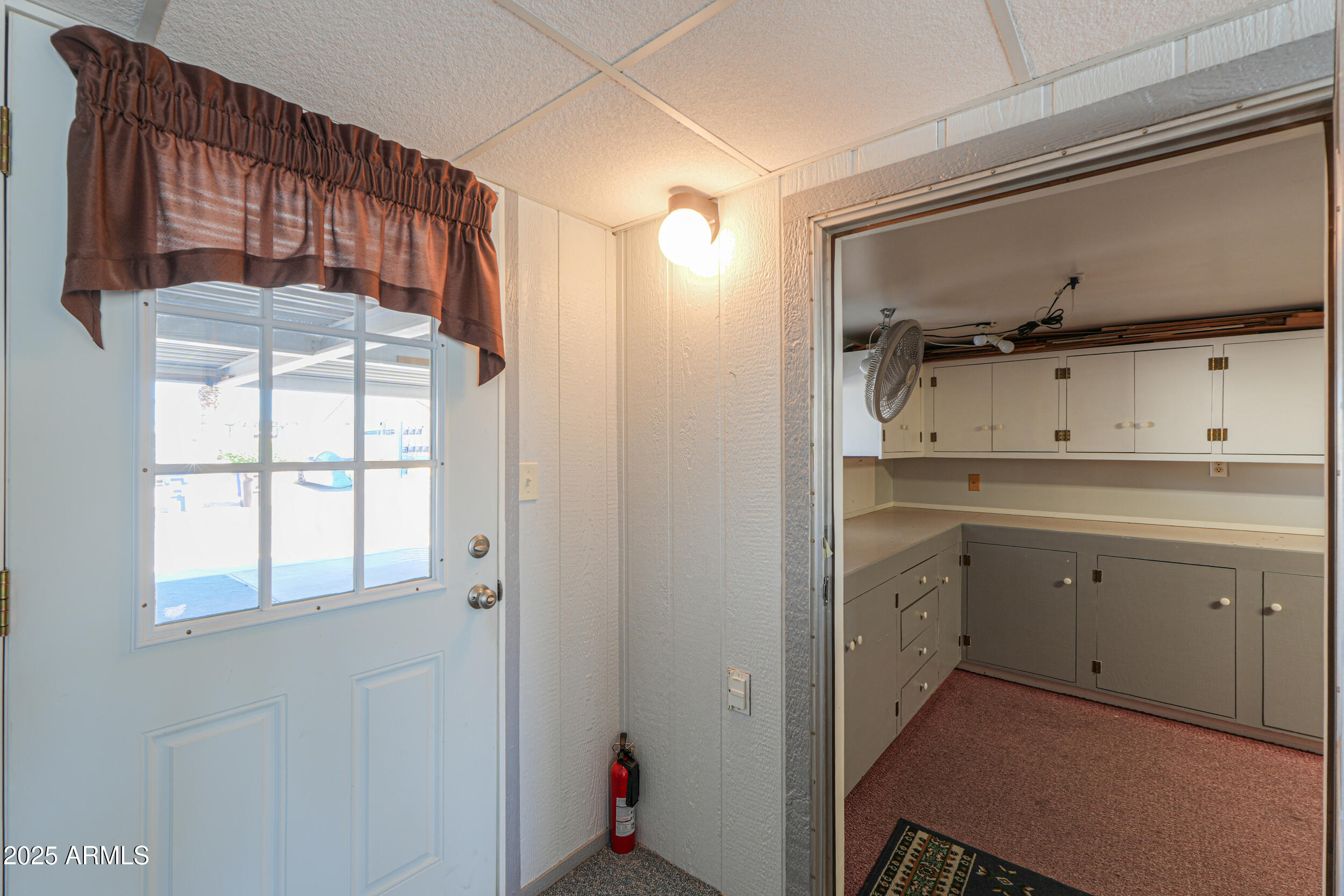 2208 West Baseline Avenue, Unit 40 Apache Junction, AZ 85120 - Photo 20 of 30 a room with a sink a mirror and shower