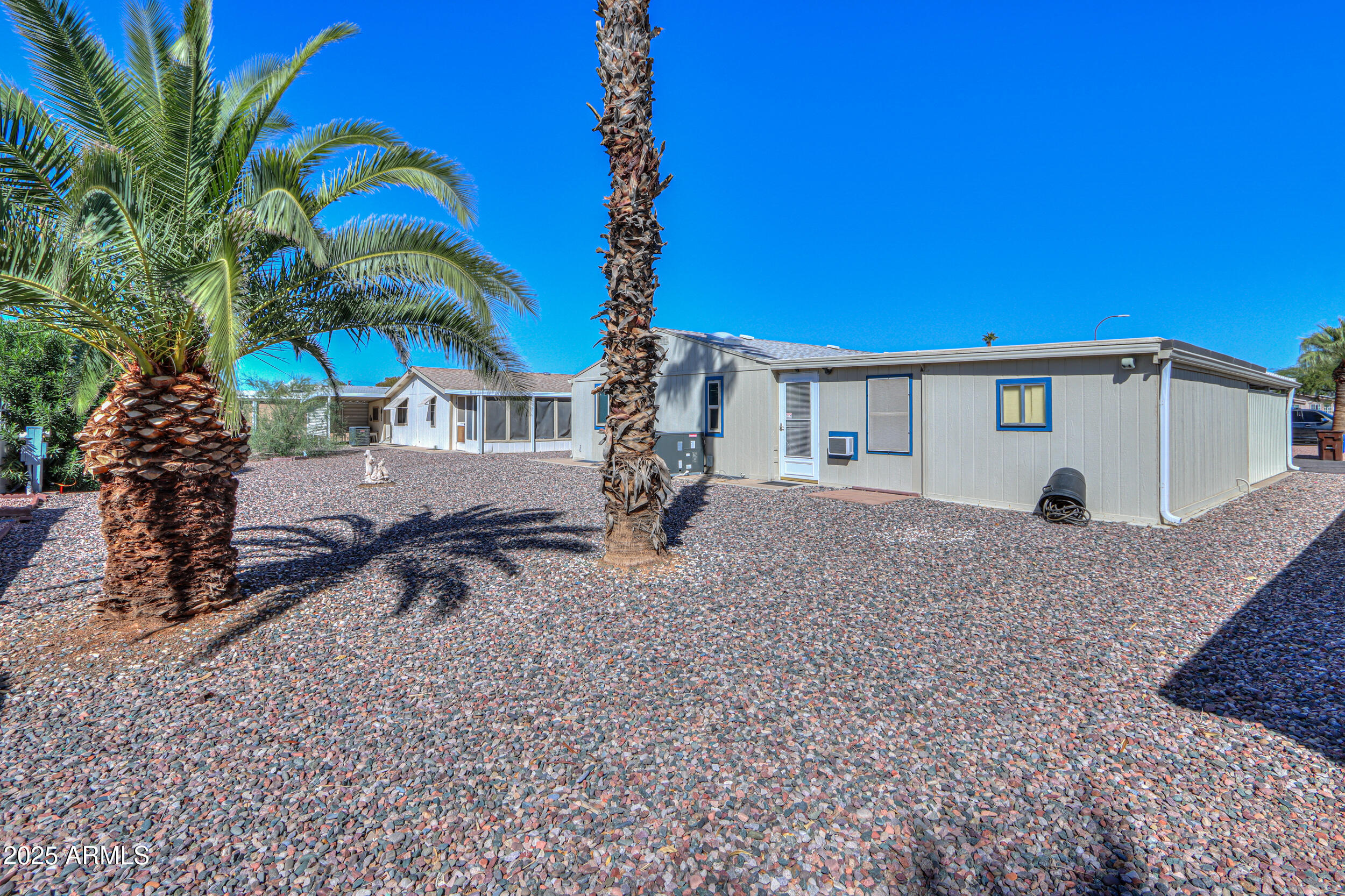 2208 West Baseline Avenue, Unit 40 Apache Junction, AZ 85120 - Photo 22 of 30 a view of a backyard