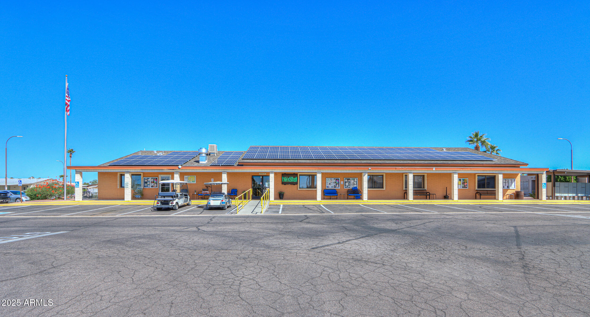 2208 West Baseline Avenue, Unit 40 Apache Junction, AZ 85120 - Photo 24 of 30 a front view of a building with street view