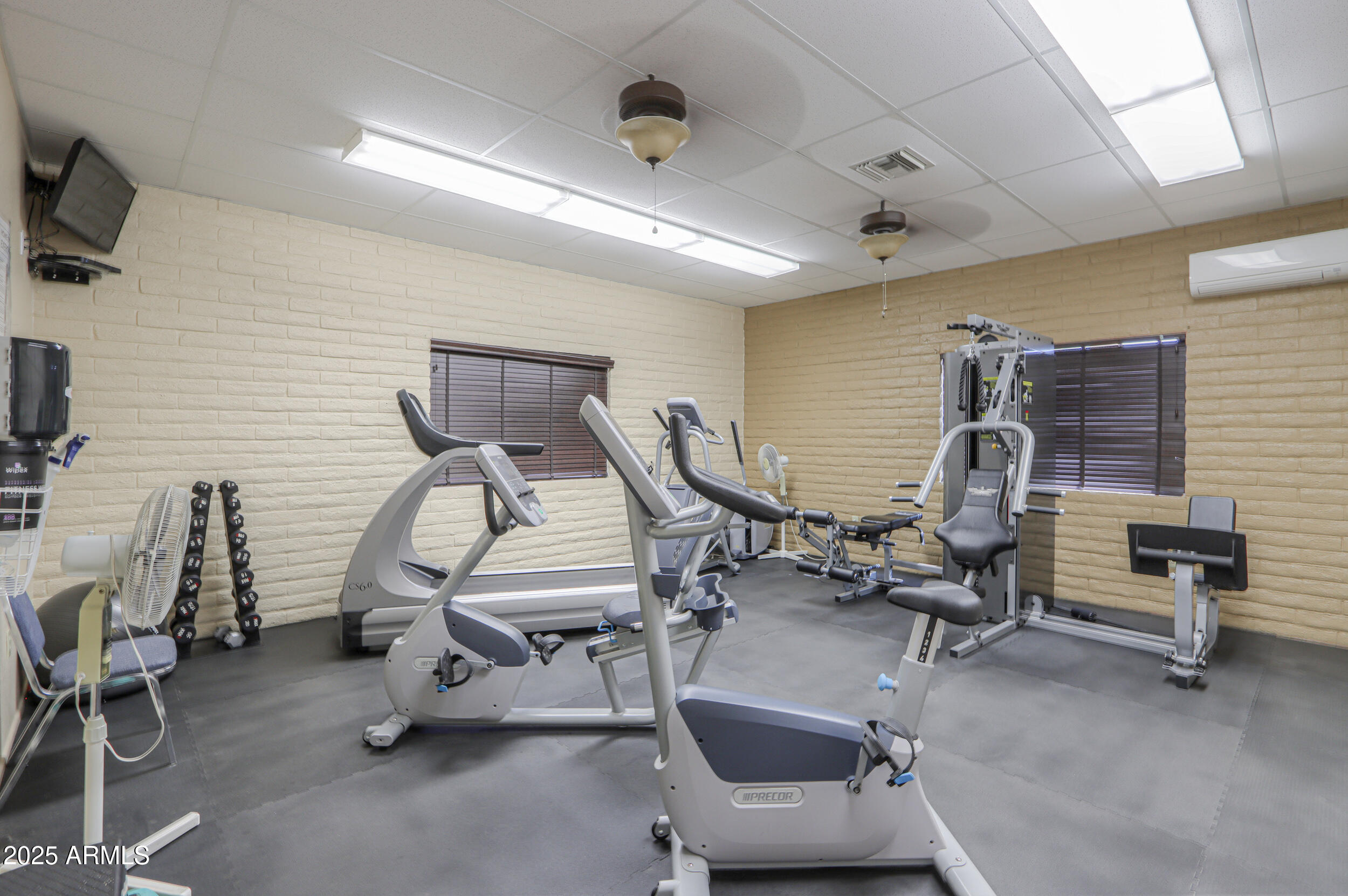 2208 West Baseline Avenue, Unit 40 Apache Junction, AZ 85120 - Photo 27 of 30 a view of a room with gym equipment