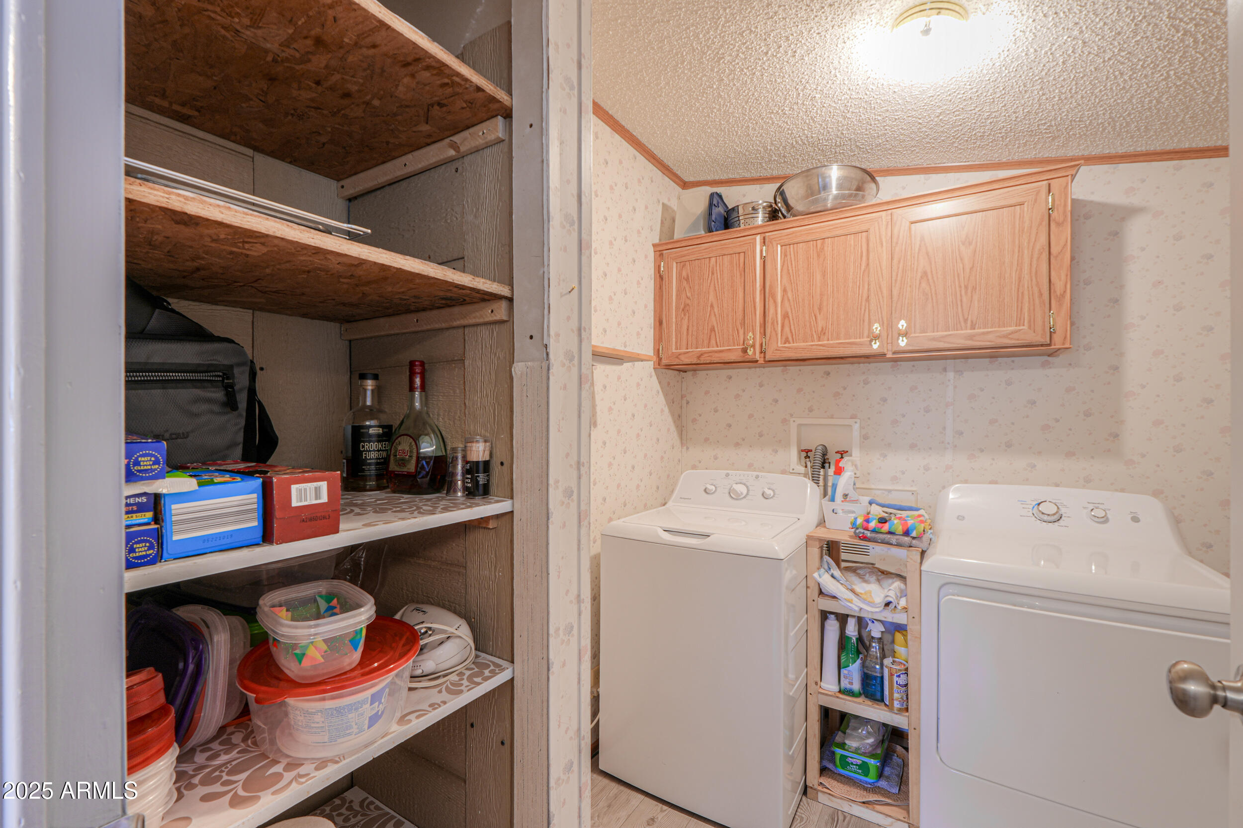 2208 West Baseline Avenue, Unit 40 Apache Junction, AZ 85120 - Photo 6 of 30 a utility room with fridge dryer and washer