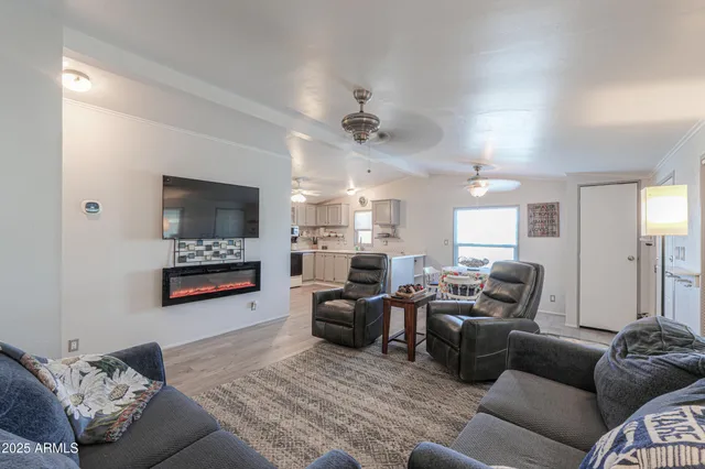 a living room with furniture and a window