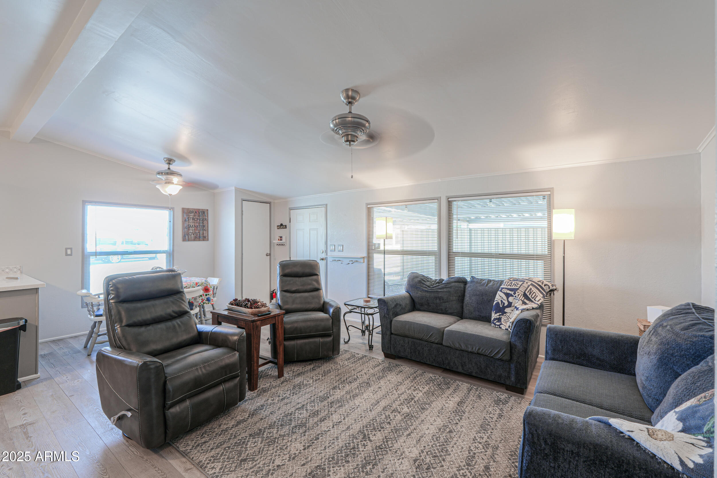 2208 West Baseline Avenue, Unit 40 Apache Junction, AZ 85120 - Photo 9 of 30 a living room with furniture and a window