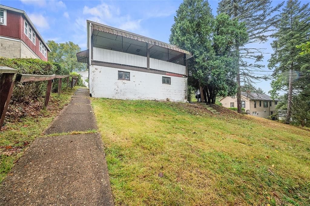 3708 Grant Street Pittsburgh, PA 15234 - Photo 17 of 36 a front view of house with yard