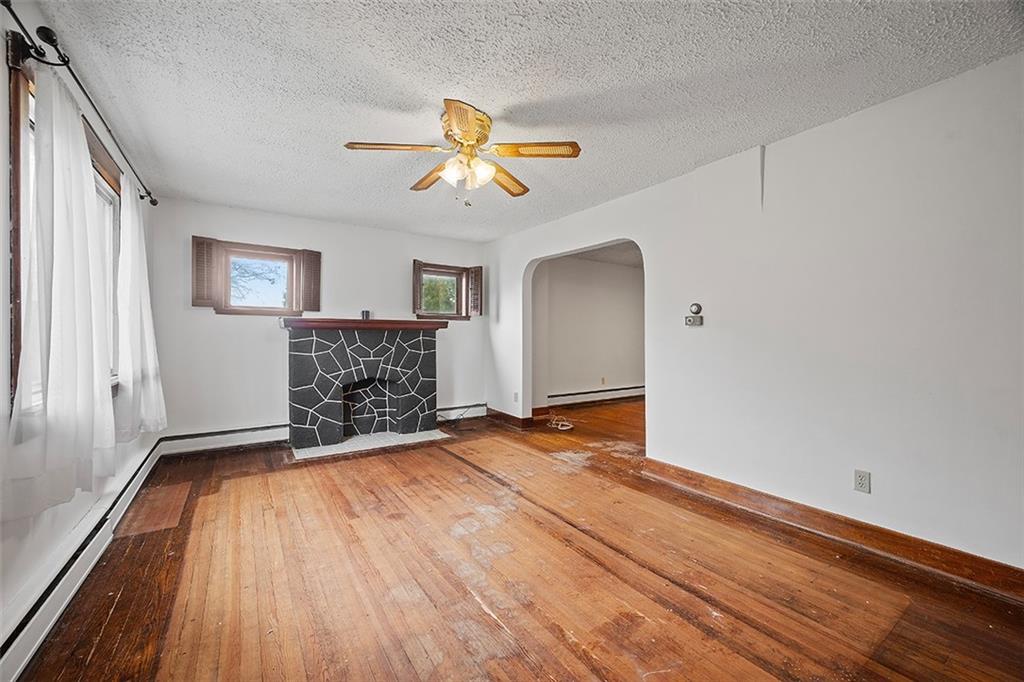3708 Grant Street Pittsburgh, PA 15234 - Photo 3 of 36 a view of empty room with wooden floor and window
