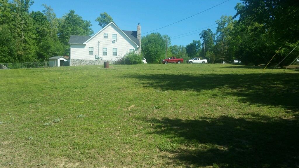 1001 Anderson Road Dickson, TN 37055 - Photo 3 of 9 a view of a house with a big yard and potted plants
