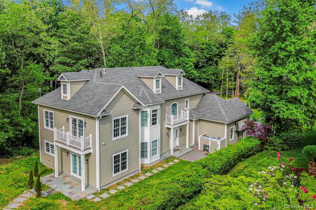 1 Kewanee Road New Rochelle, NY 10804 - Photo 36 of 36 a aerial view of a house with a yard plants and large trees