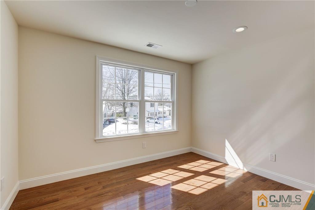 29 Fairfax Road Edison, NJ 08817 - Photo 17 of 21 a view of an empty room and window