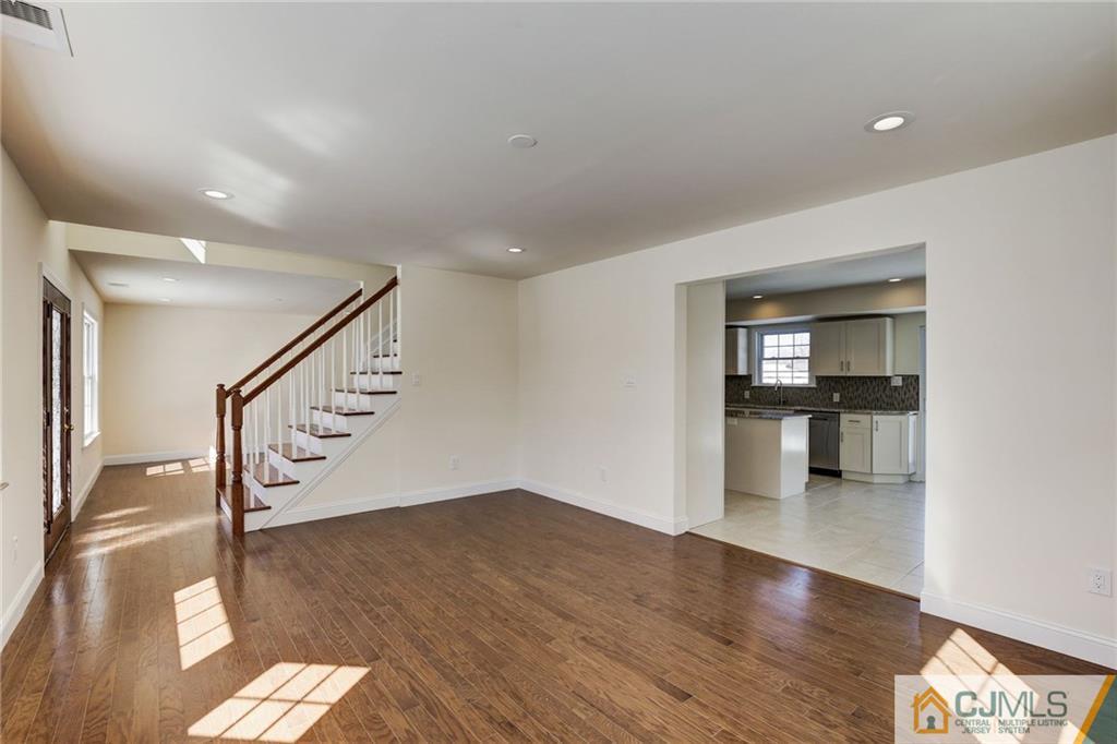 29 Fairfax Road Edison, NJ 08817 - Photo 4 of 21 a view of an entryway with wooden floor