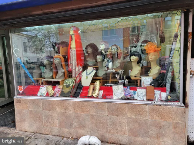 a room with storage and a flat screen tv