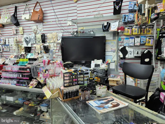 a view of a workspace with furniture